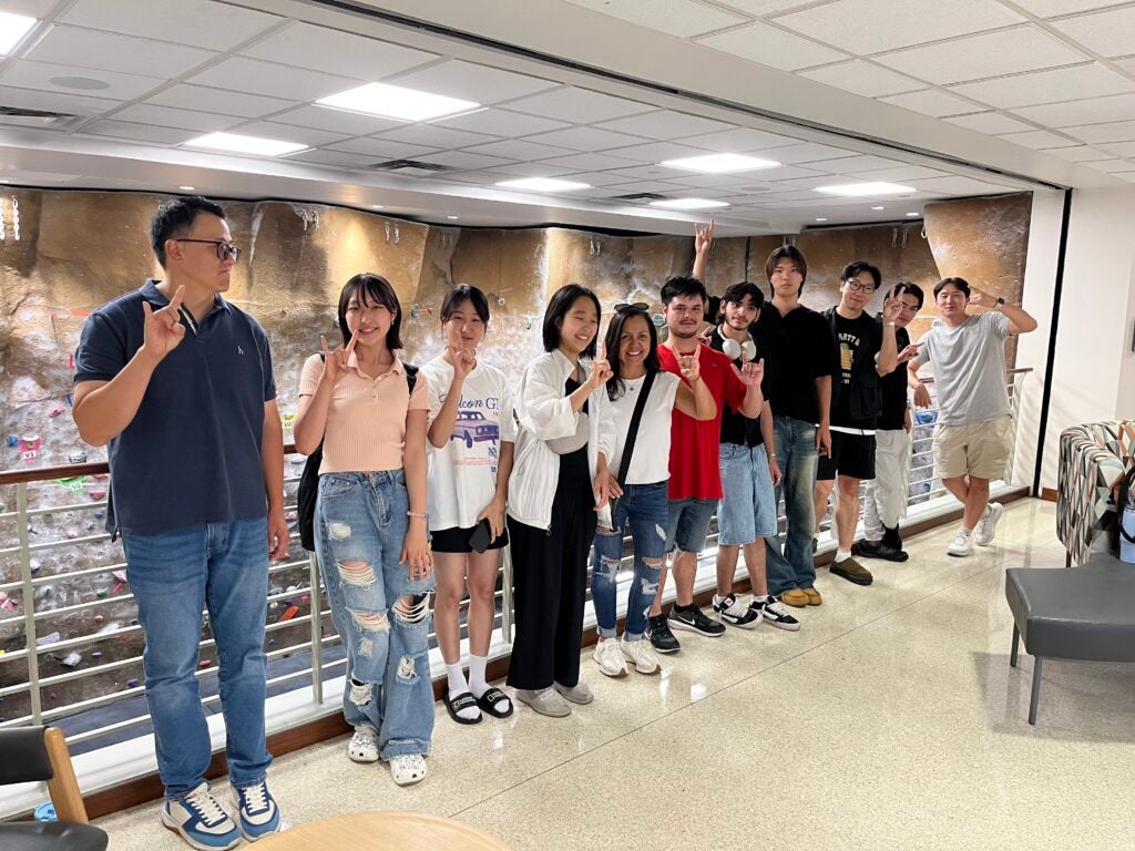 a group of ESL students  in one of the RecSports Gyms