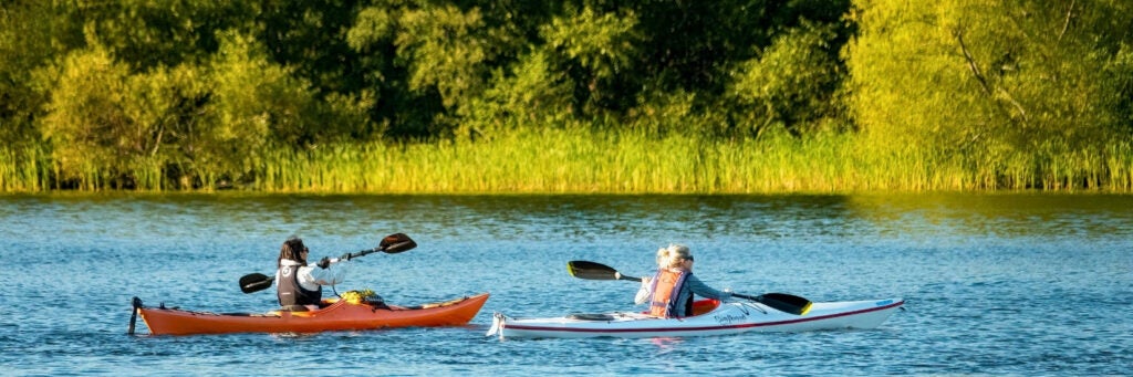 Kayakers enjoy time on Lady Bird Lake, Austin