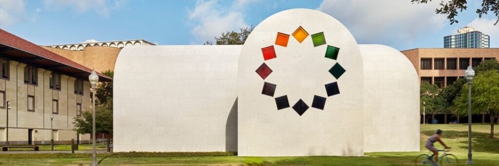 Sculputral building installation "Austin" by Ellsworth Kelly is on display at the UT Campus. Visitors can interact with a space where light colored by stain glass windows plays off the surrounding space.
