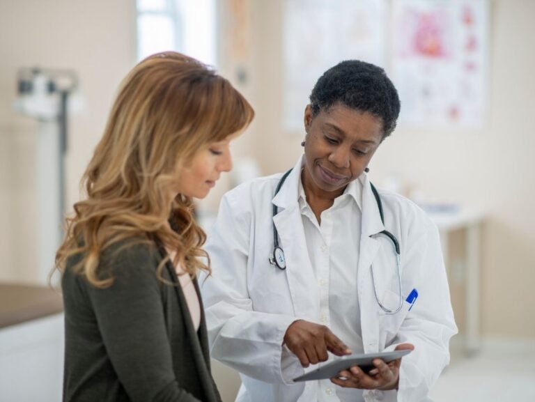 Two people in a consultation setting